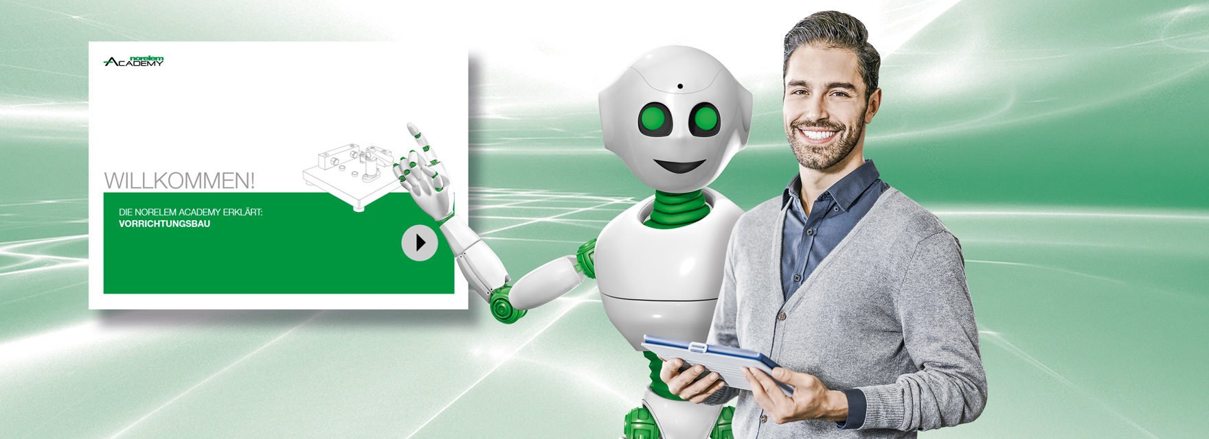 norelem Roboter zeigt auf Bild hinter sich, recht daneben steht ein Mann mit Tablet