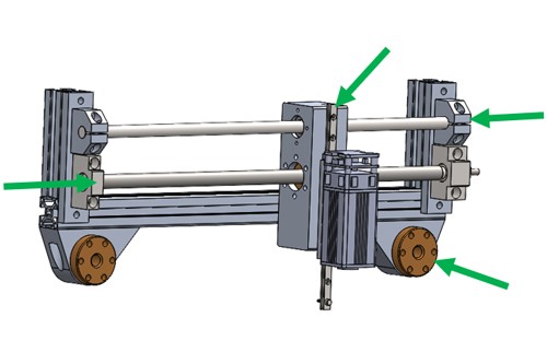 technische Zeichnung Lasergravurmaschine mit grünen Pfeilen auf bestimmte Stellen